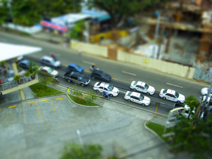 Toy Cars outside Golden Prince Hotel